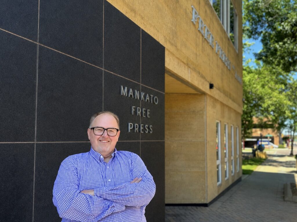 Todd Benz outside the Mankato Free Press building