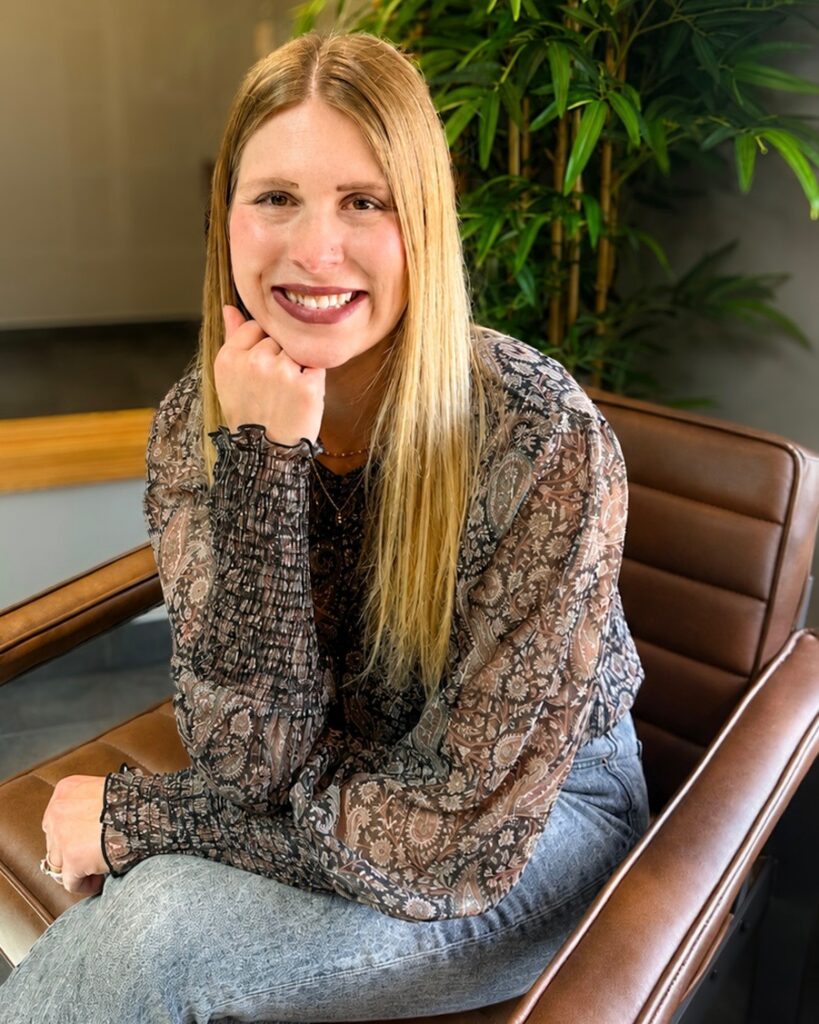 Kaelyn Rahe of Minnesota Elevator Incorporated poses for a headshot in the MEI offices.