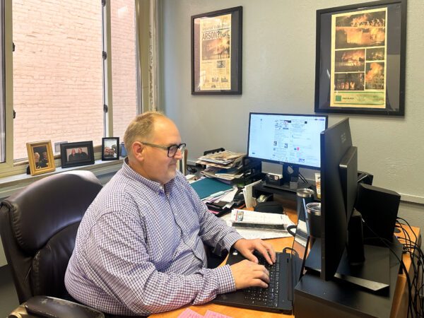 Todd Benz at his Mankato Free Press desk