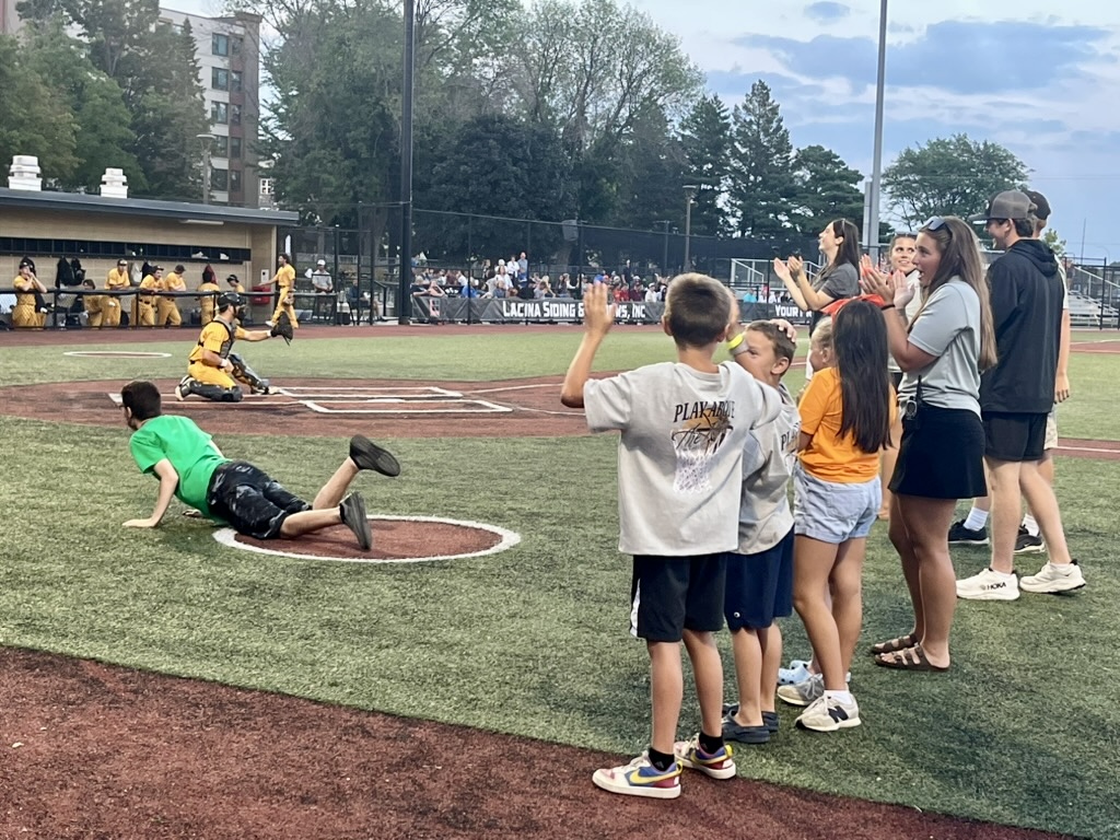 Kids enjoying a MoonDogs game