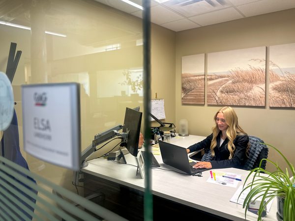 Elsa-Marie at her desk in the GMG Inc offices.